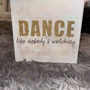 Dance like nobody’s watching sign